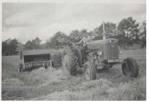 Brian baling with an MF165